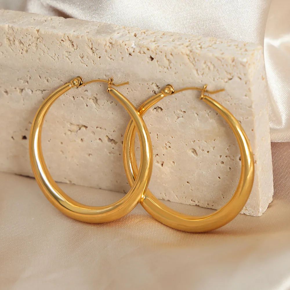 Classic gold hoop earrings with secure clasp