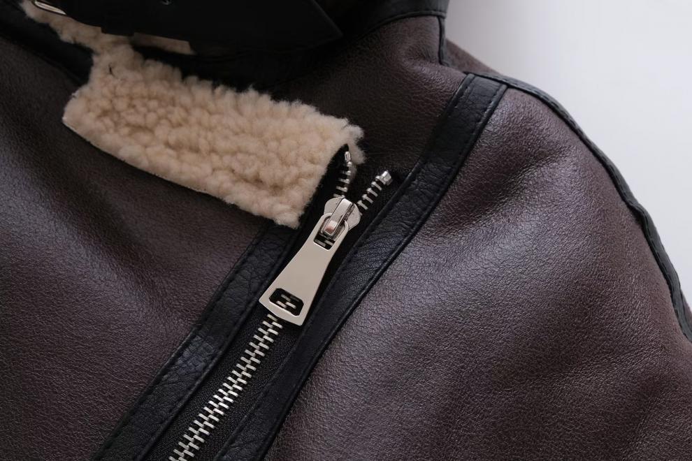close up of front zipper closure for winter faux leather, fur trimmed motorcycle style jacket for women- Cruelty free , vegan friendly fashion