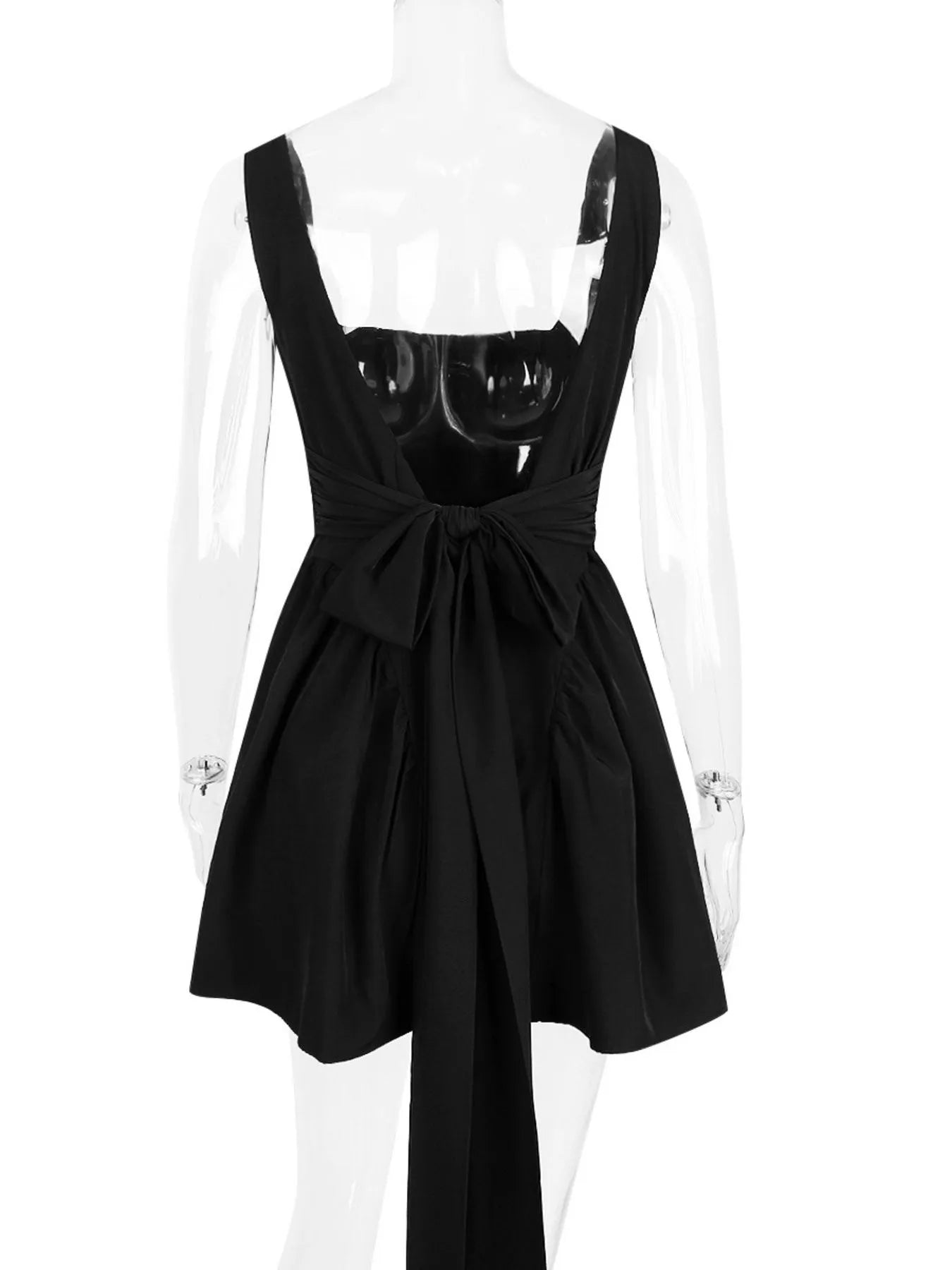 back view of black square neck open-back mini dress on mannequin