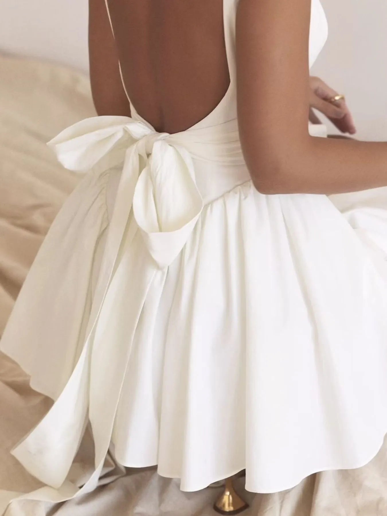 Backless Square Neck Mini Dress on woman back view in white color