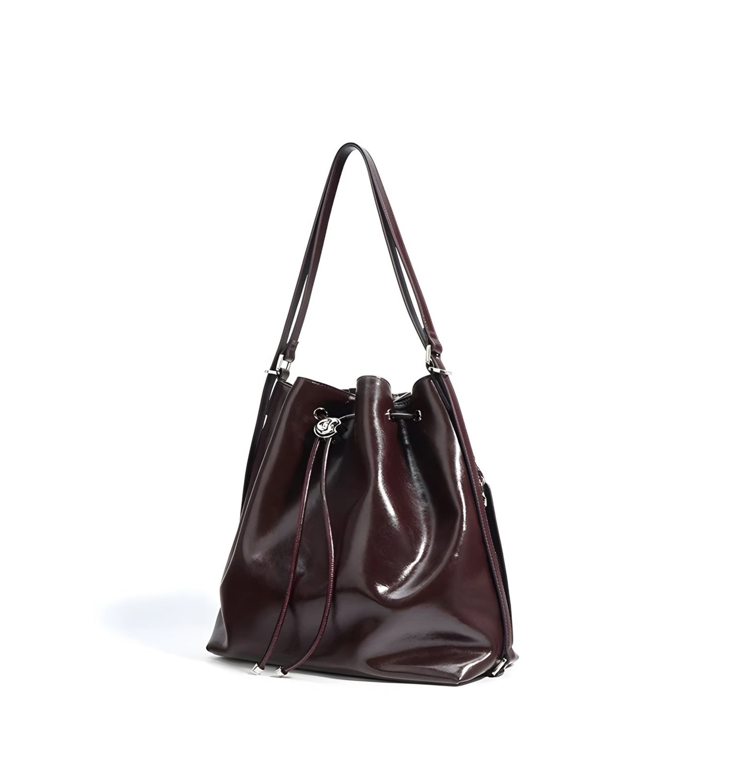 Deep burgundy genuine leather drawstring bucket handbag on a white background side view