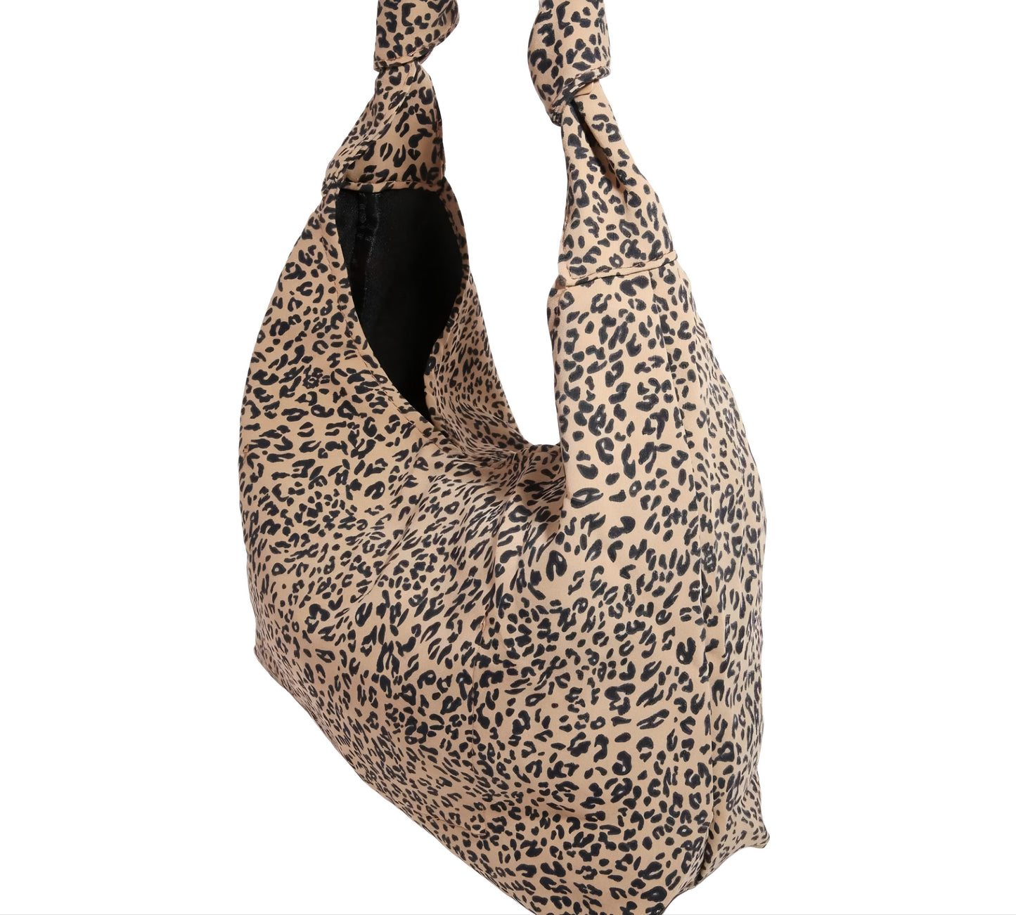Side view of brown leopard print bag on a white background