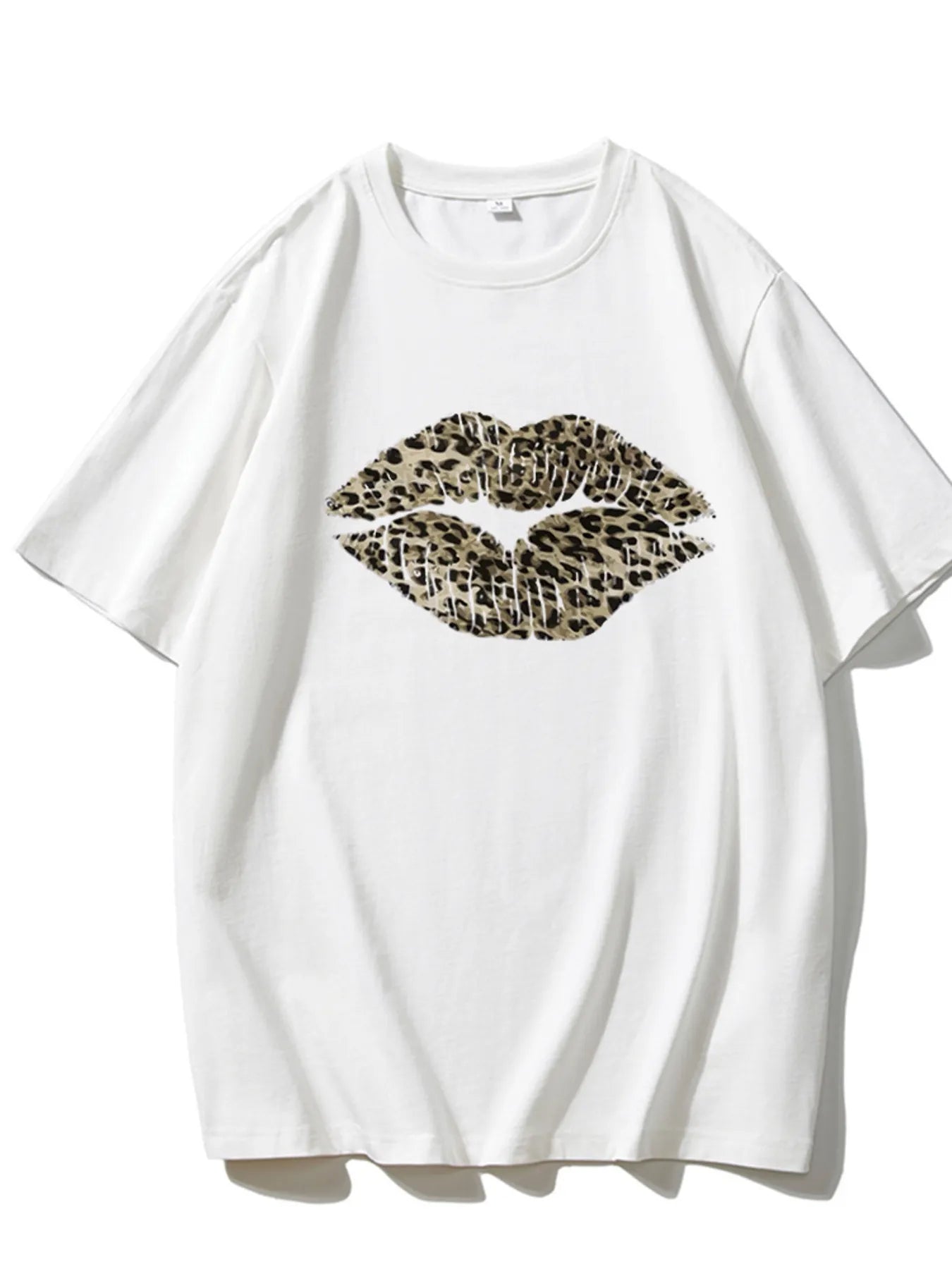 White leopard print lip graphic tee flat lay on white background