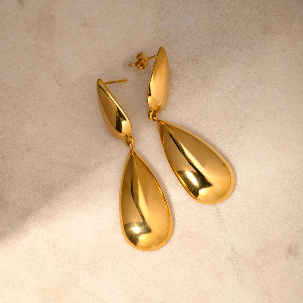 Minimalist gold drop earrings with modern design