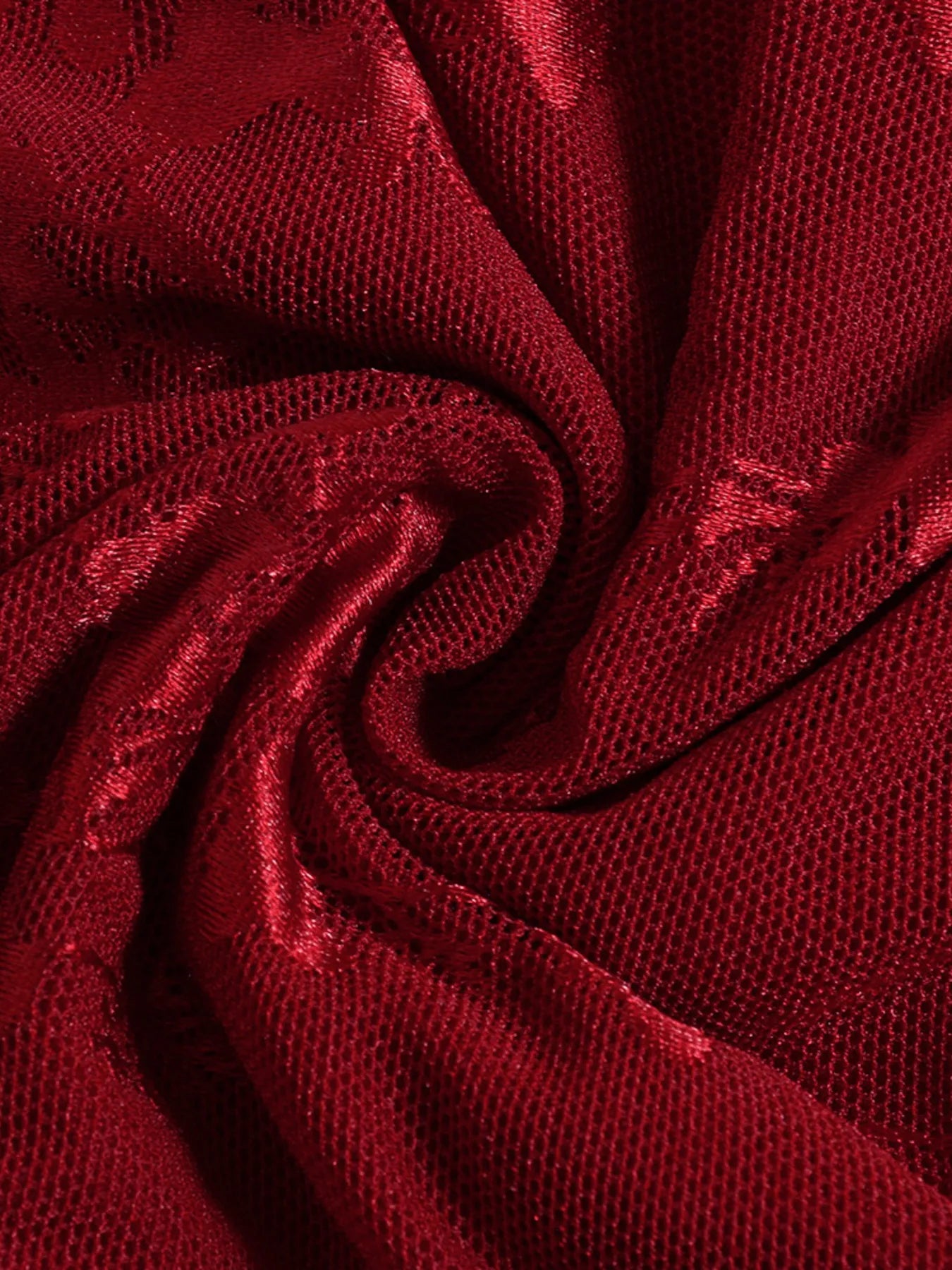 Close-up of red textured fabric forSweetheart Neck Draped Off-Shoulder Bodycon mini Dress
