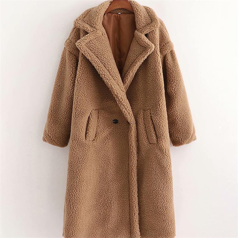 A long brown plush teddy coat with long sleeves, front buttons and pockets, displayed on a hanger against a white background.