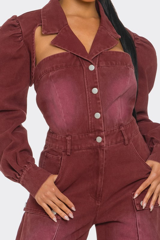 close up view of denim puff shoulder long sleeve button front jumpsuit with cutout detail and oversized pockets for women trendy fall fashion