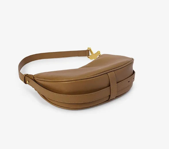 bottom view of brown genuine leather shoulder bag with adjustable strap on white background