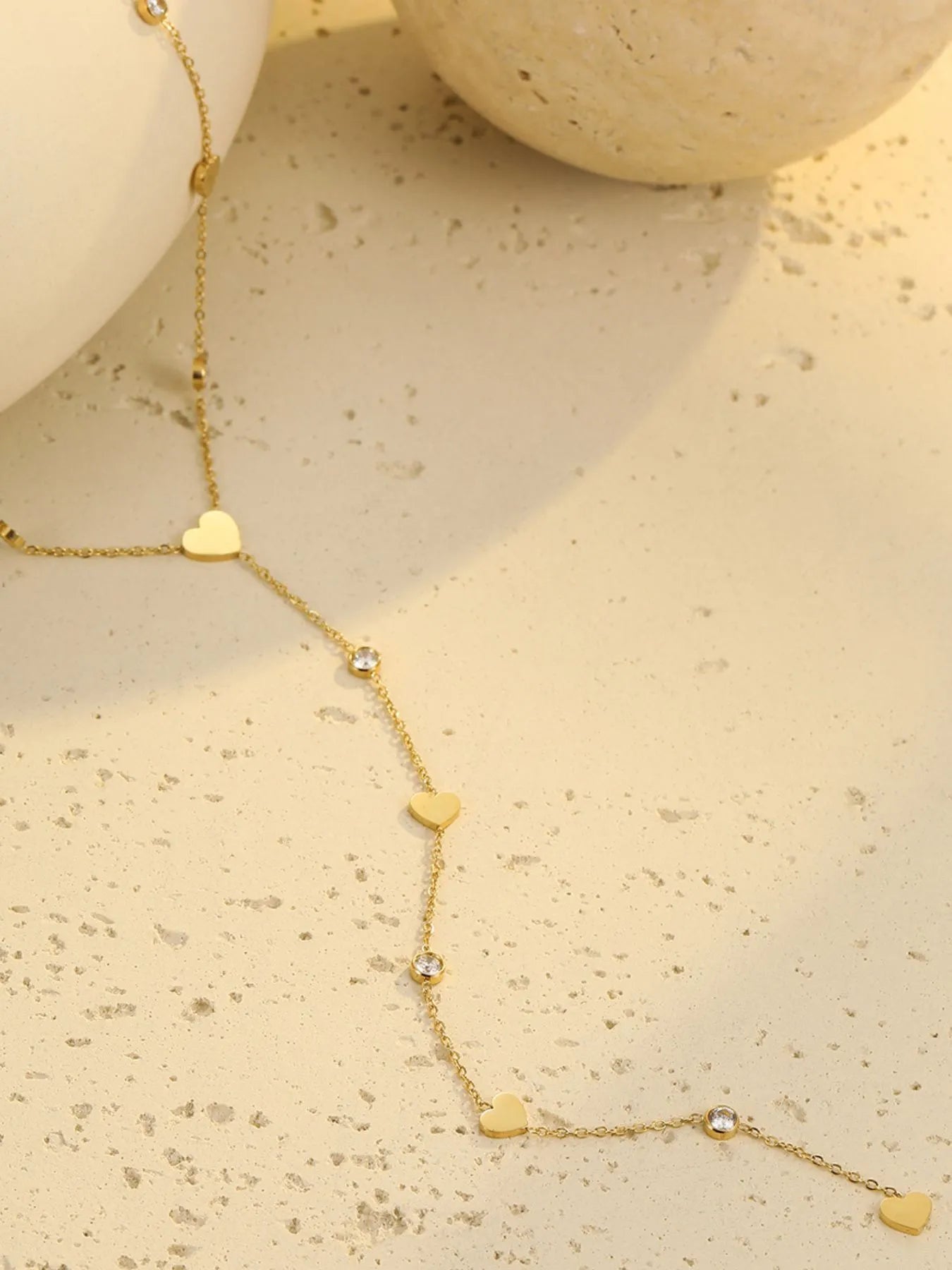 Dainty gold necklace with heart-shaped cubic zirconia