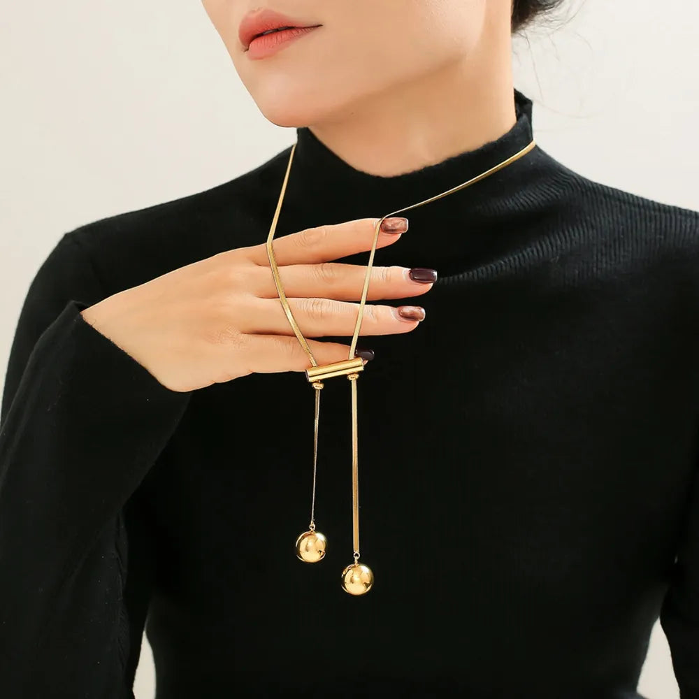 18K gold plated hollow bead necklace in titanium steel on model