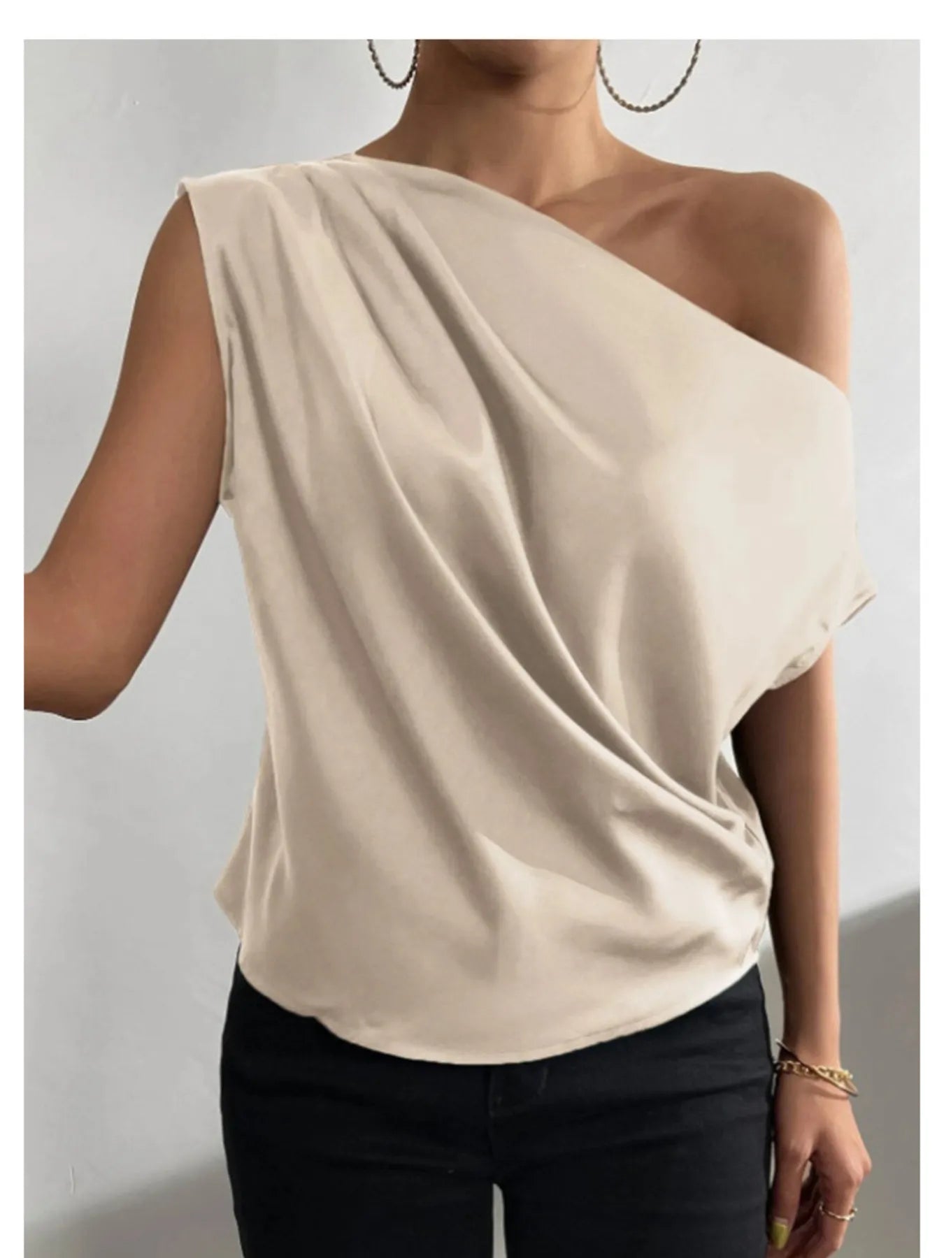 Woman wearing a Beige satin Asymmetrical One-Shoulder Draped Blouse 