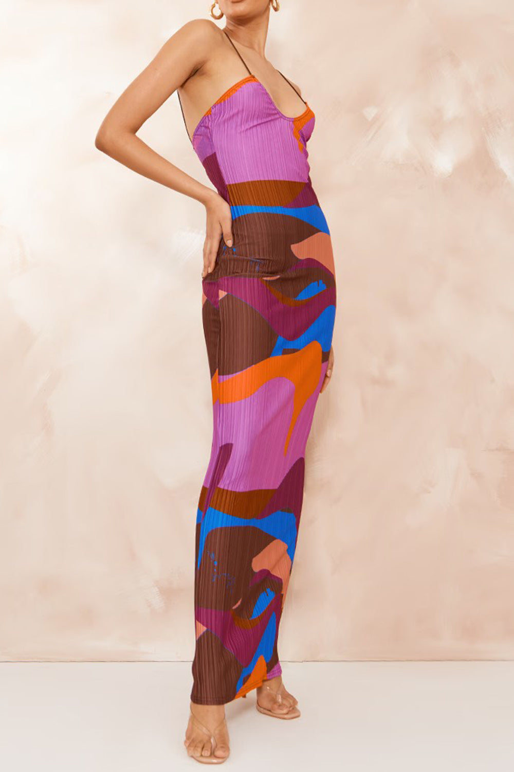 Model wearing  Backless purple Maxi Cami Dress side view with hand on right hip