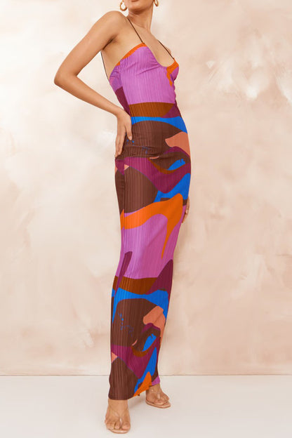 Model wearing  Backless purple Maxi Cami Dress side view with hand on right hip