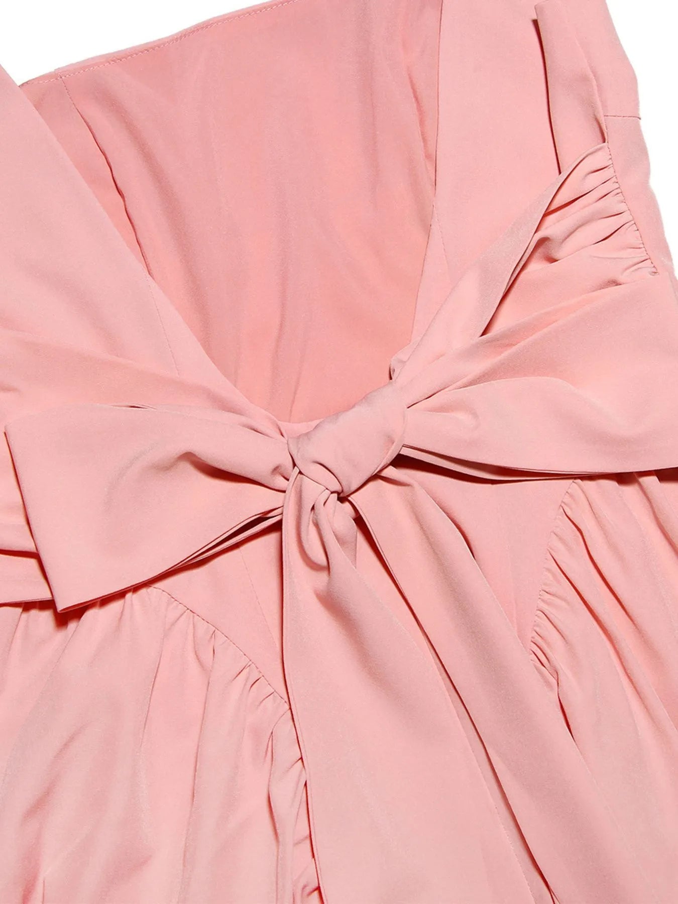 close up of back view of backless square neck mini dress with bow 