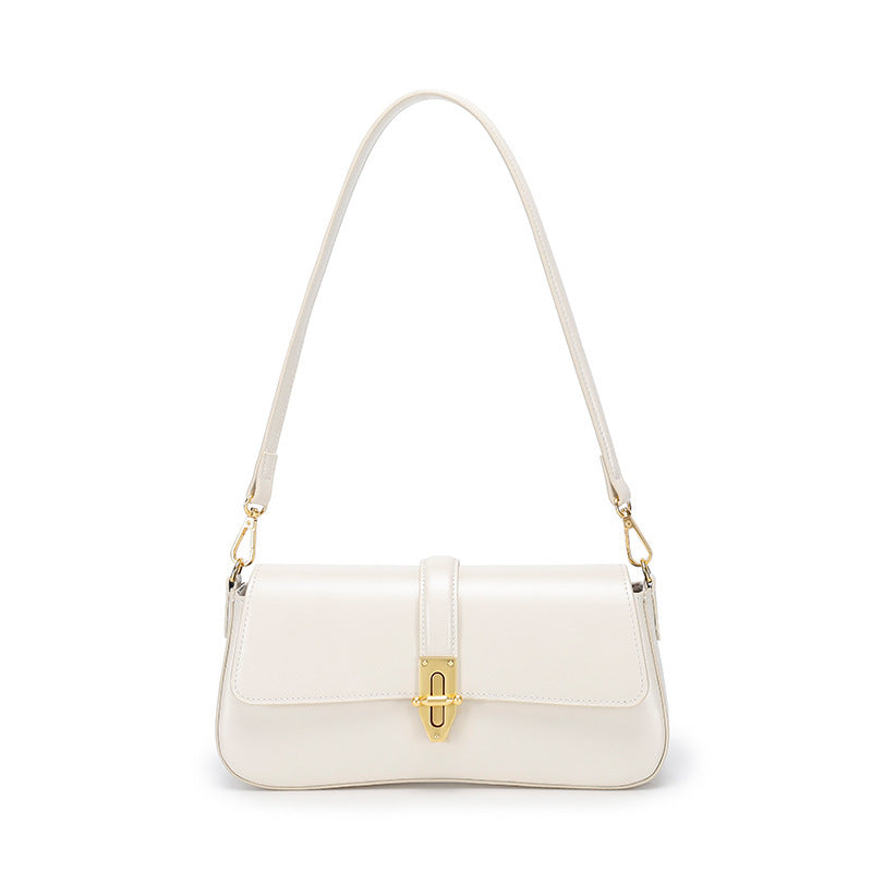 White real leather women's handbag with a gold clasp on a white background