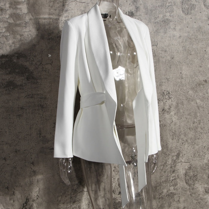 Luxury minimalist white belted blazer for two-piece suit for women on a mannequin