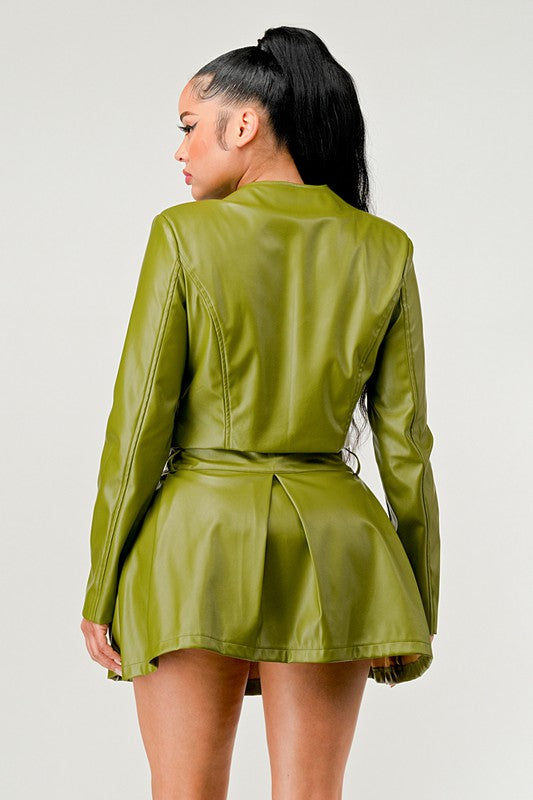 Back view of women’s olive green PU leather jacket and skirt set