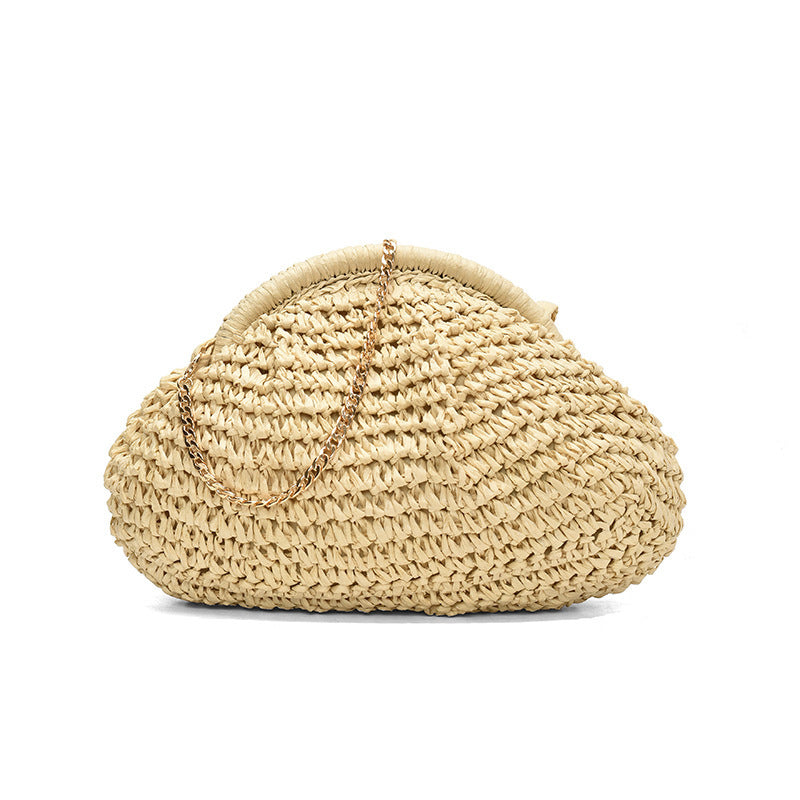 Woven straw handbag on a white background