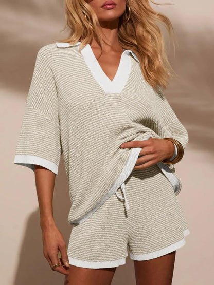 woman wearing a ivory collared contrast striped knit top and matching shorts co-ord lounge set.