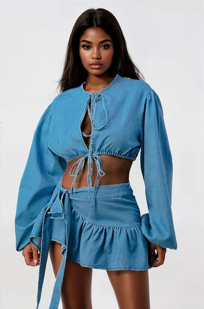 Model wearing denim dreams two-piece set (crop top + skirt) front view
