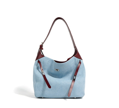 Light blue Denim & Genuine Leather Contrast Tote Bag on a white background