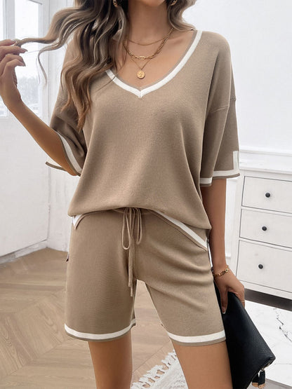 Lightweight two-piece loungewear set for women in mocha/tan color on model with  purse