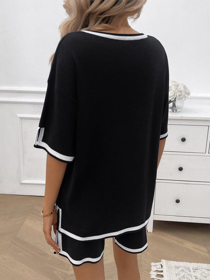 Casual two-piece summer outfit with shorts and top in black on model back view