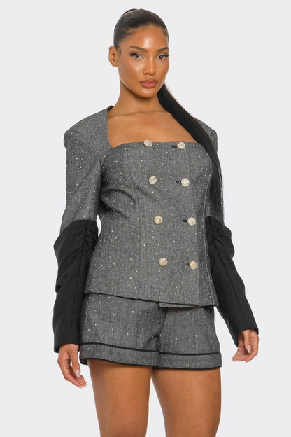 double breasted tweed blazer and shorts set for women on a model on a white background