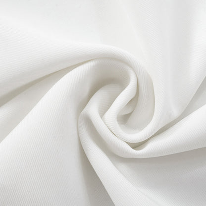 Close-up of white fabric with a subtle texture