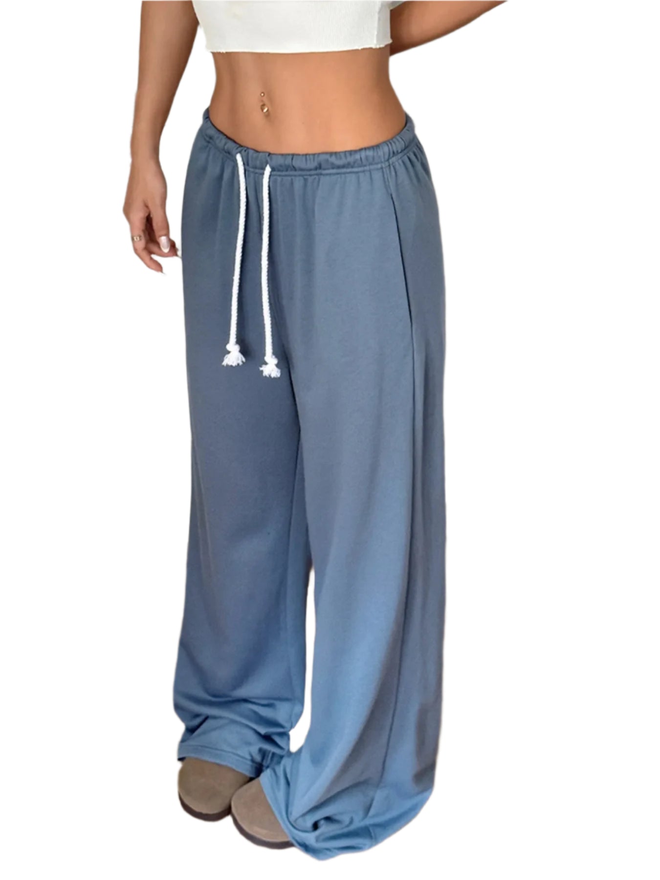 Woman wearing blue wide-leg athleisure pants with a white drawstring