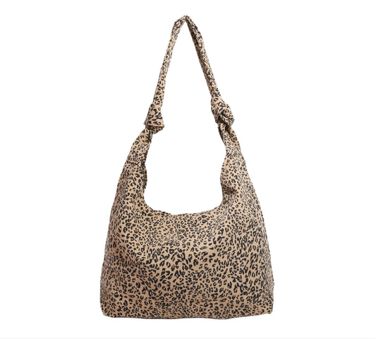 Brown leopard print handbag tote with knotted shoulders on a white background