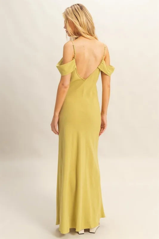 Model wearing HYFVE cami maxi dress with scoop neckline and flattering fit back view