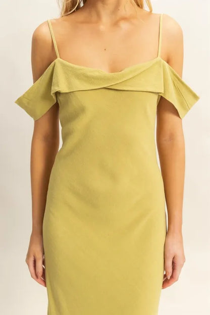 Close-up of neckline and straps on flattering fit maxi dress on model