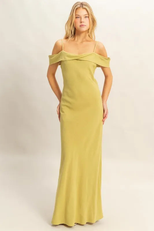 Model posing in HYFVE cami maxi dress with scoop neckline and flattering fit front view