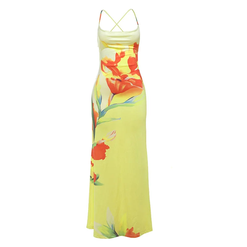 Vacation-ready floral print boho maxi dress free form on a white background