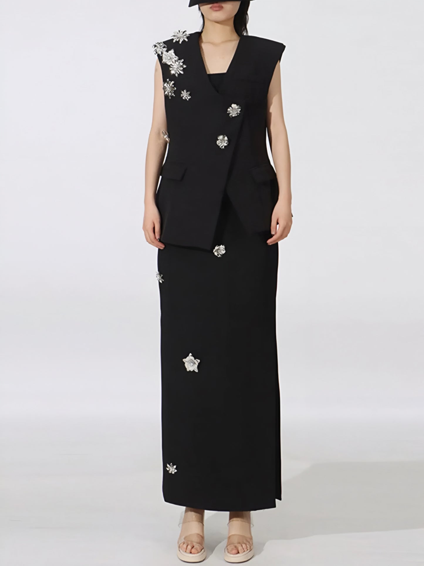 Luxury floral embellished sleeveless vest and midi skirt set  worn by a woman