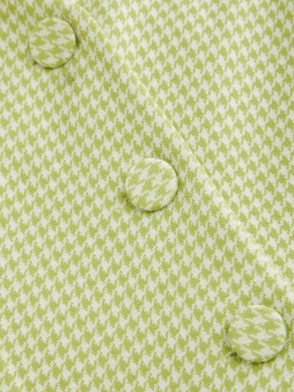 Close-up of a green and white fabric  of Gingham Button-Front A-Line Mini Dress buttons.