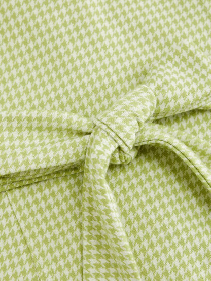 Close-up of Gingham Button-Front A-Line Mini Dress back fabric with a bow tie 