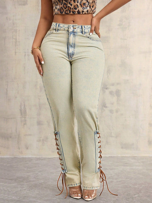 Model wearing vintage wash lace up denim front view