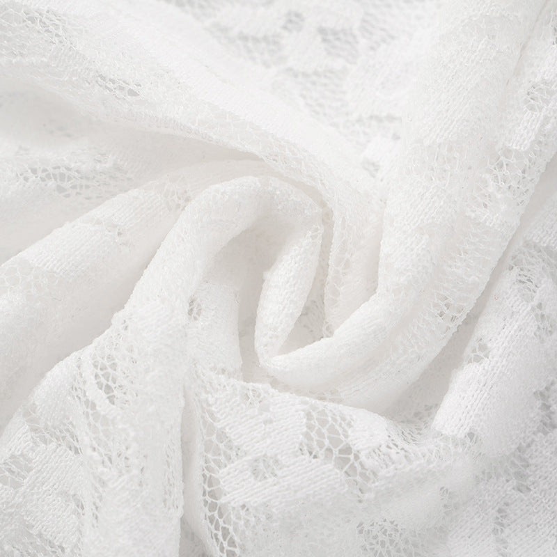 Close-up of white textured lace fabric