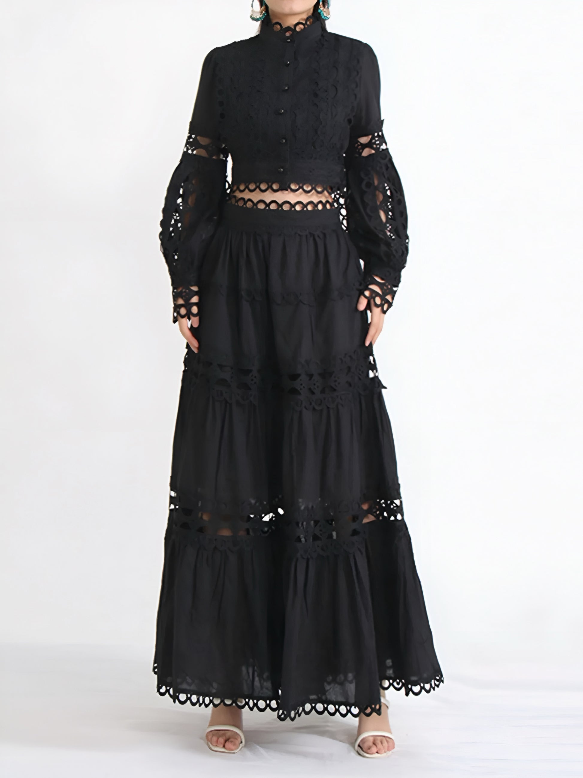 Black lace button blouse and maxi skirt formal women’s two piece matching outfit set on a woman posing in a white backgorund