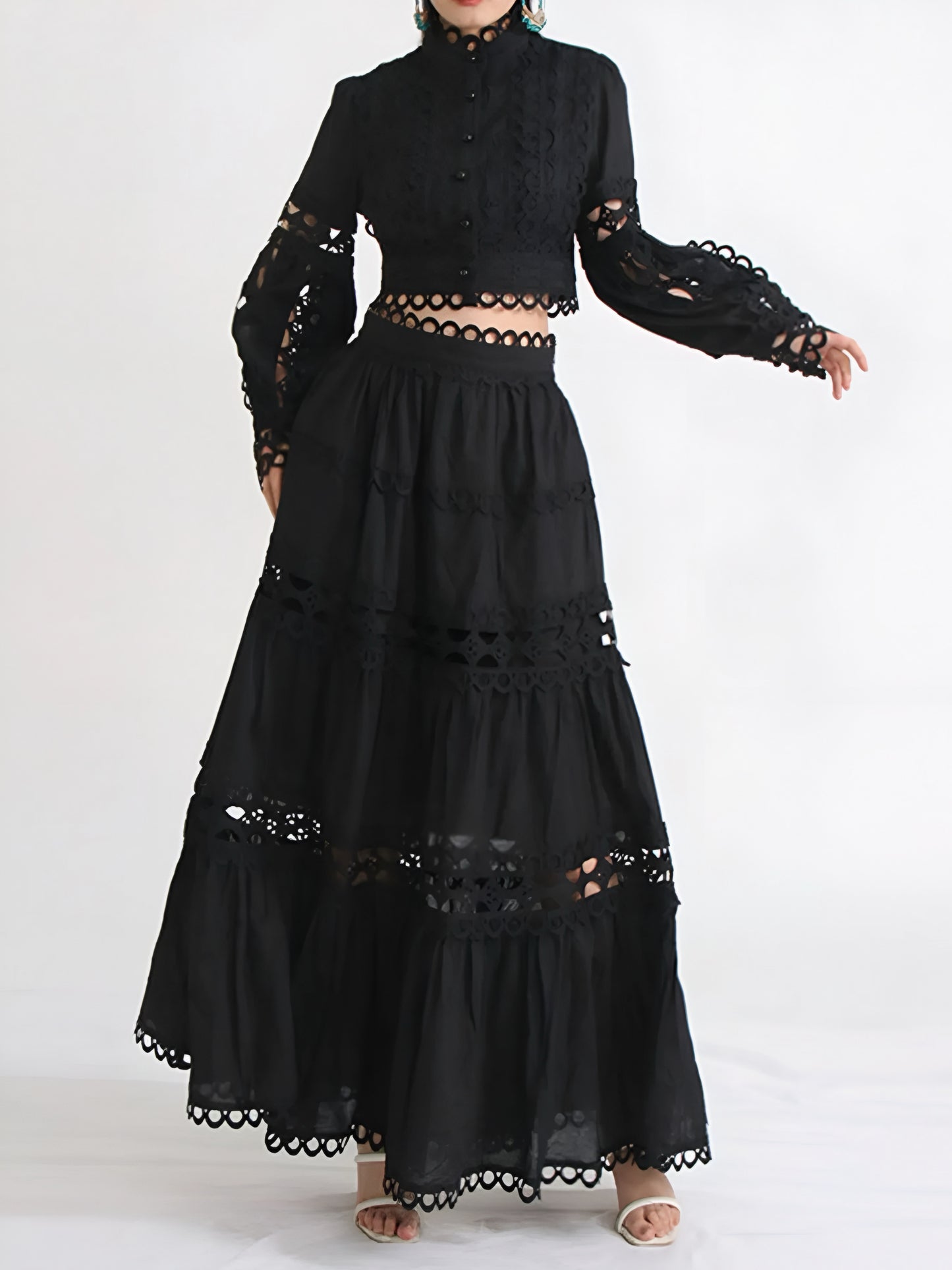Elegant black lace button short top and maxi skirt formal two piece co-ord set on a woman