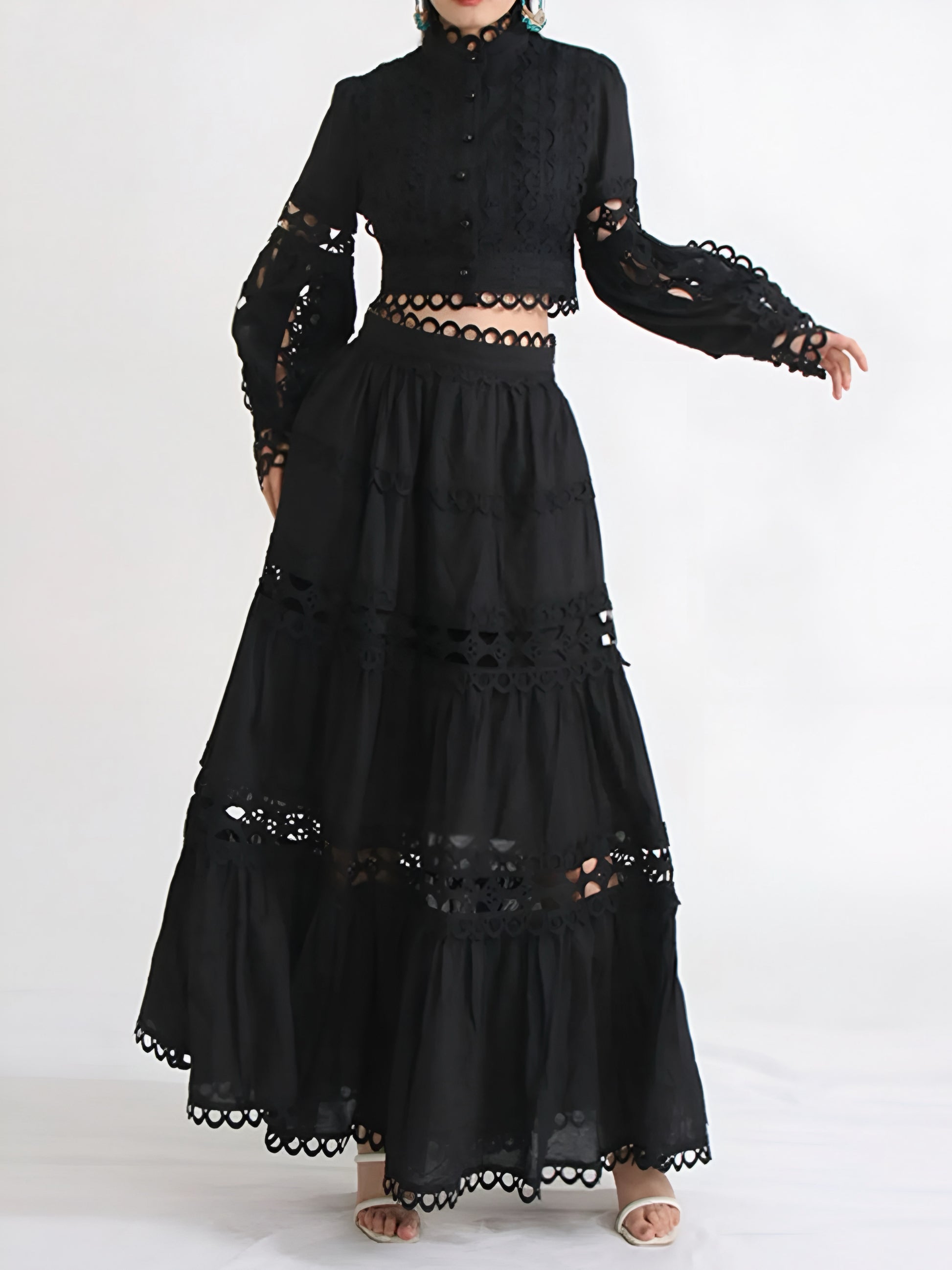 Elegant black lace button short top and maxi skirt formal two piece co-ord set on a woman