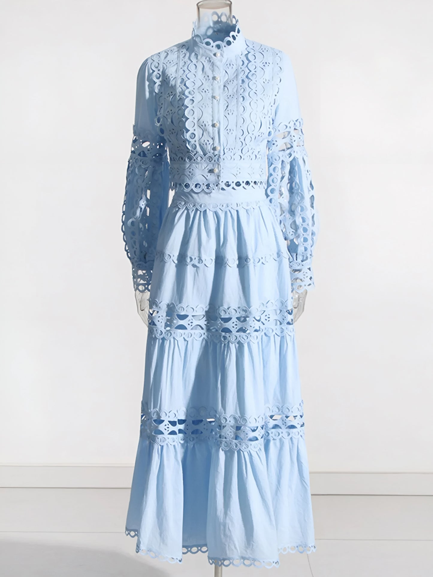 Light blue lace two-piece matching set – crop top and maxi skirt on a mannequin on a white background