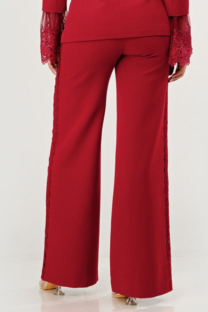 Red / Burgundy tailored trouser wide leg high waisted pants with lace detailing on a white background