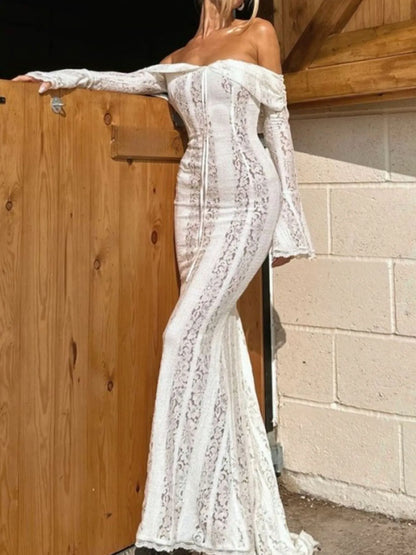 Model in white lace maxi dress with flounce sleeves, perfect for weddings