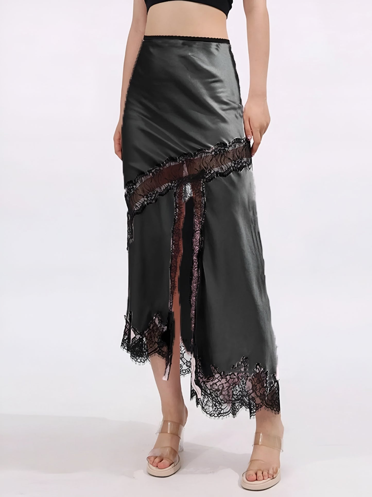 luxury high fashion black satin skirt with lace trim with front slit worn by a woman on a white background