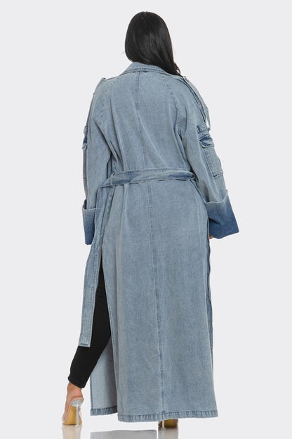 Back of longline street luxe denim trench coat with oversized cuffs and waist belt 