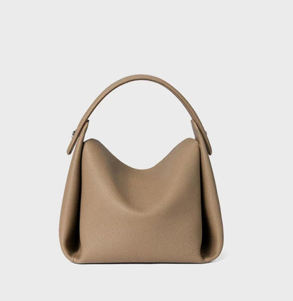 Beige Minimalist Genuine Leather Small Bag on a light gray background