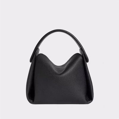 Black Minimalist Genuine Leather Small Bag on a light gray background